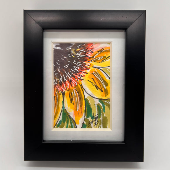 Small black framed sunflower