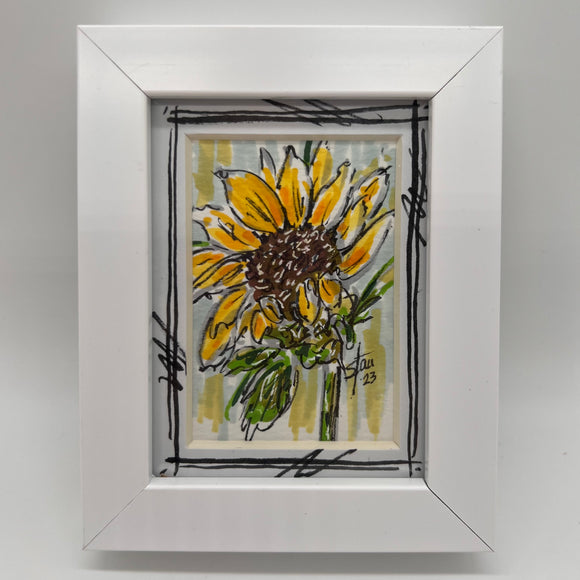 Small white framed sunflower