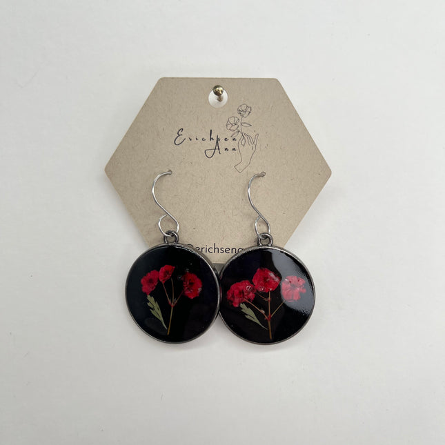 Red Flowers in Black Circles