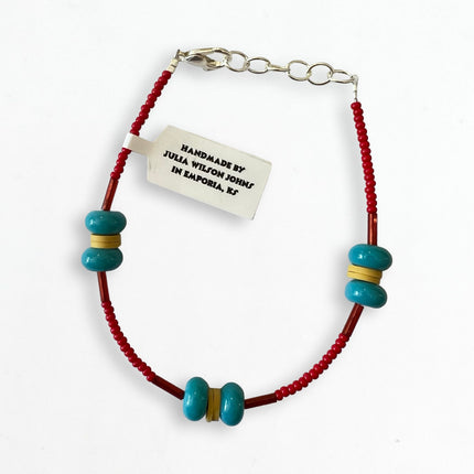 Red, Teal, Cream